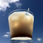 White Russian cocktail pictured from below.