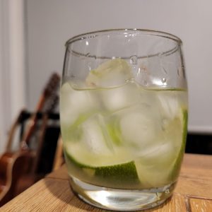 A Caipiroska cocktail on a table.