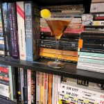 A Perfect Martini on a bookshelf.