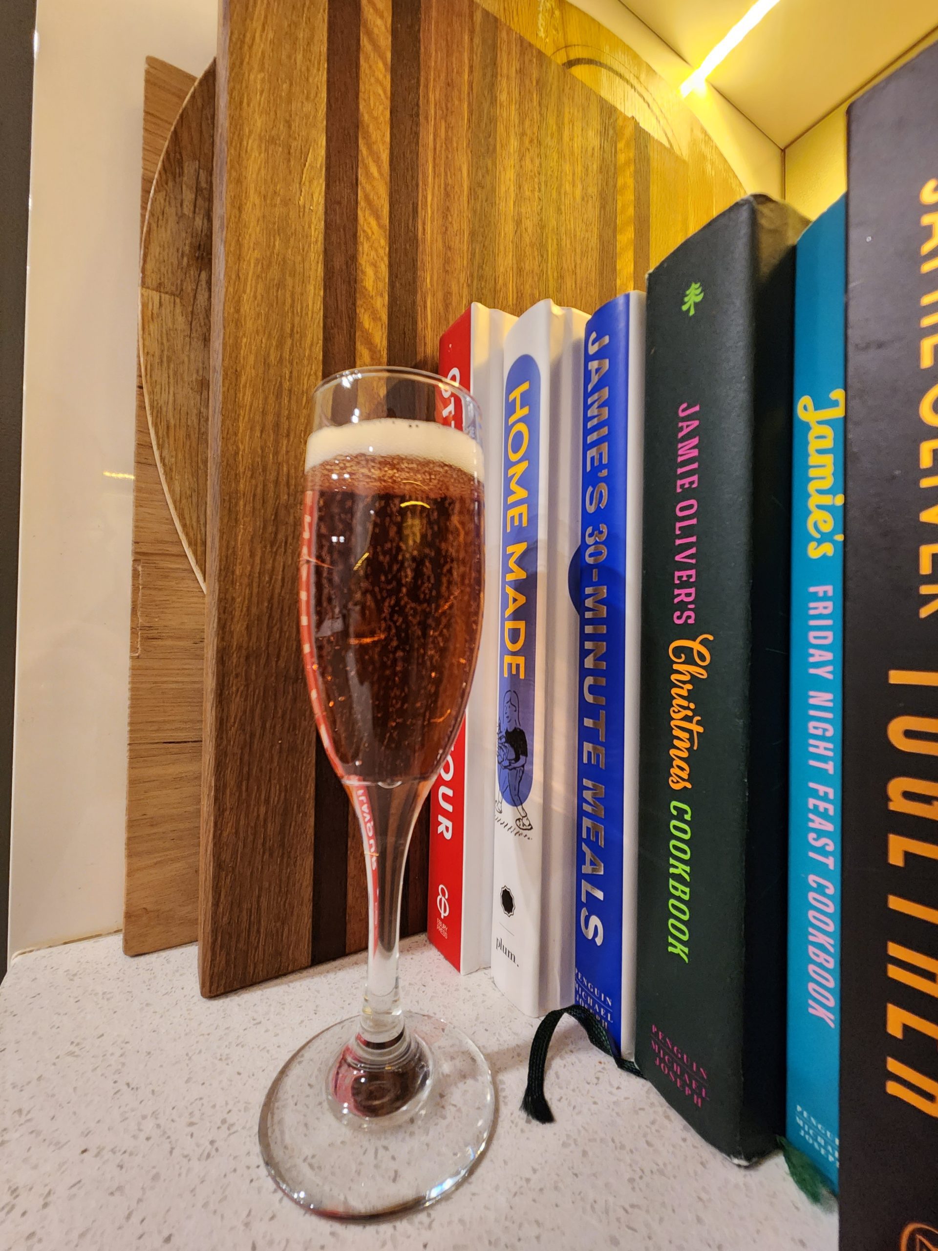 A Kir Royale cocktail in a Champagne flute.